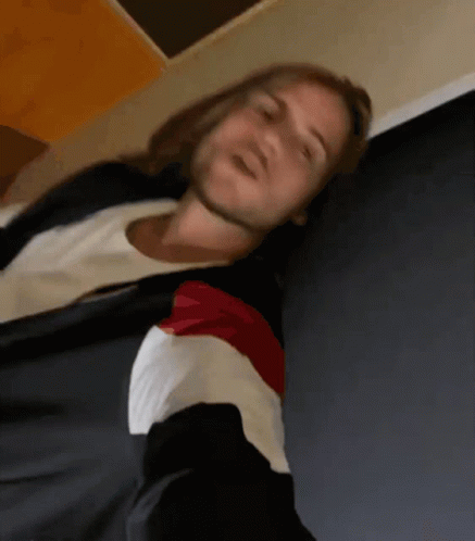 Blurry Picture Of Man With Long Hair GIF