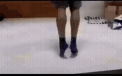 Blurry Picture Of Two People Dancing In Living Room GIF
