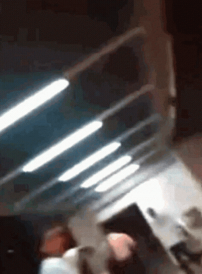 Blurry Room With Ceiling Lights GIF