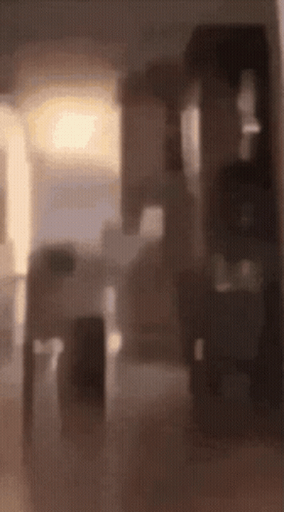 Blurry Room With Light Through Doorway GIF