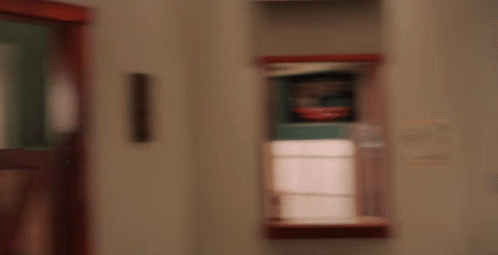 Blurry Room With Window And Shelf GIF