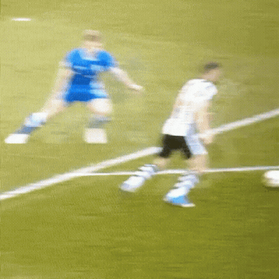 Blurry Soccer Game Player In Blue Shirt GIF