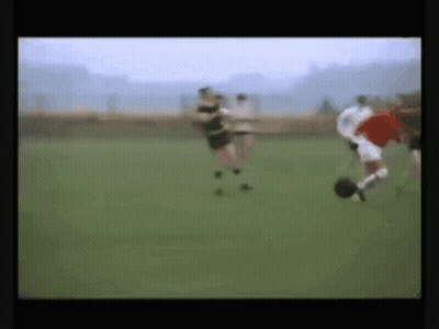 Blurry Soccer Game With Red Player GIF