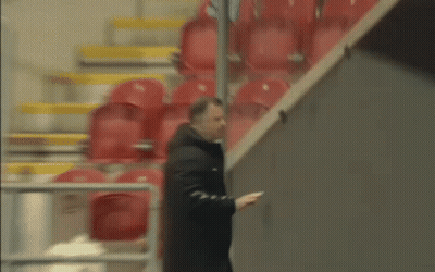Blurry Soccer Player In Blue Jersey Celebrating GIF