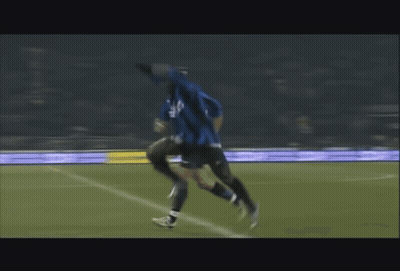 Blurry Soccer Player In Blue Jersey With P GIF