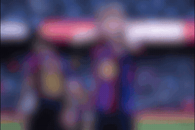 Blurry Soccer Player In Purple Jersey GIF
