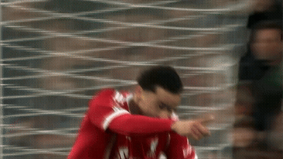 Blurry Soccer Player In Red Liverpool Jersey GIF