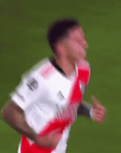 Blurry Soccer Player In White And Red Jersey GIF