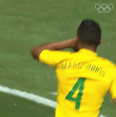 Blurry Soccer Player In Yellow Jersey Number 4 GIF