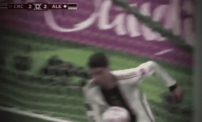 Blurry Soccer Player Kicking Ball GIF