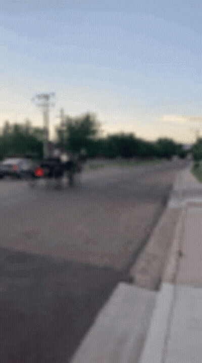 Blurry Street With Car Driving GIF