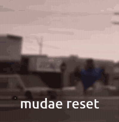 Blurry Street With Mudae Reset Text GIF