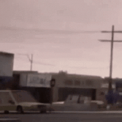 Blurry Street With Parked Cars