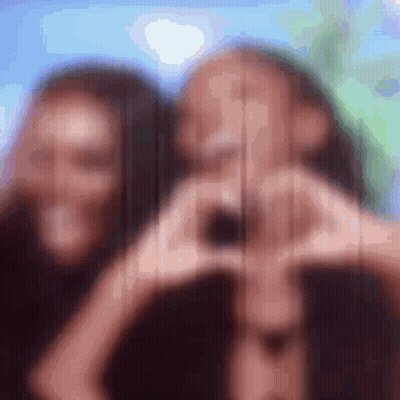 Blurry Two Women Making Heart GIF