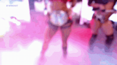 Blurry Woman Dancing On Pink Floor GIF