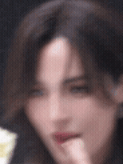 Blurry Woman Face Hand To Mouth GIF