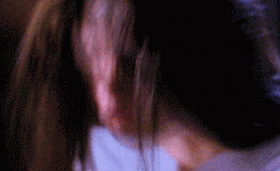 Blurry Woman Face With Black Cat GIF