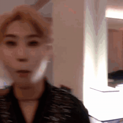Blurry Woman Face With Light Behind GIF