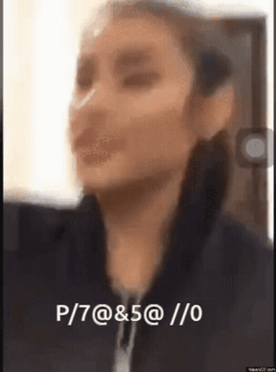 Blurry Woman Face With P 7 @ & 5 @ / 0 GIF