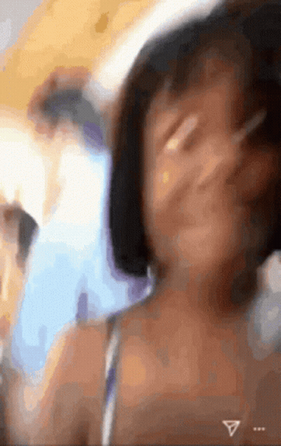 Blurry Woman Face With Triangle GIF