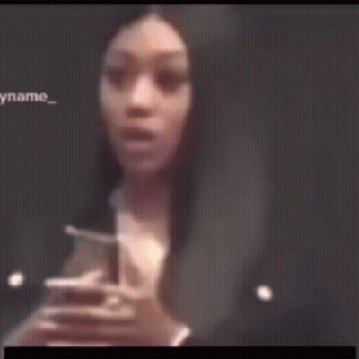 Blurry Woman Holding Hands To Face GIF