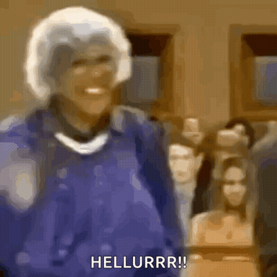 Mujer borrosa con chaqueta morada diciendo Hellurrr GIF