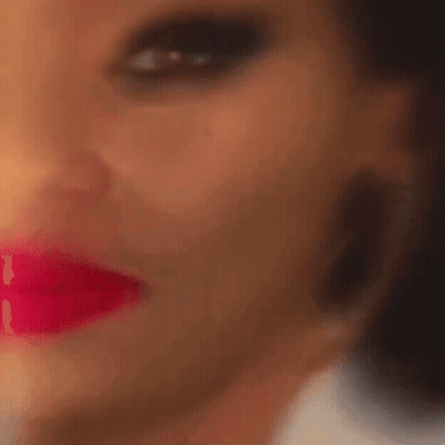 Blurry Woman's Face With Red Lips GIF