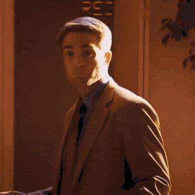 Blurry Woman Standing In Front Of Window GIF