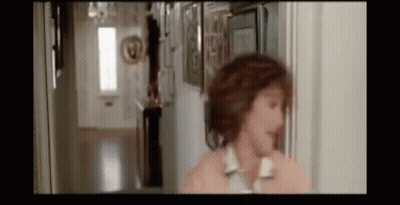 Blurry Woman Talking On Phone GIF