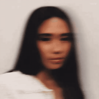 Blurry Woman With Long Dark Hair GIF