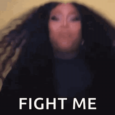 Blurry Woman With Long Hair Saying Fight Me GIF