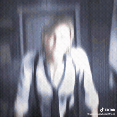 Blurry Woman With TikTok Watermark GIF