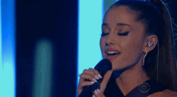 Blushing Ariana Grande GIF