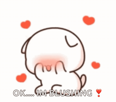 Blushing Cartoon Character With Hearts GIF