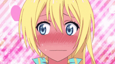 Blushing Girl With Blonde Hair And Blue Eyes GIF
