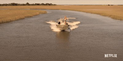 Boat Going Down River With Netflix Logo GIF