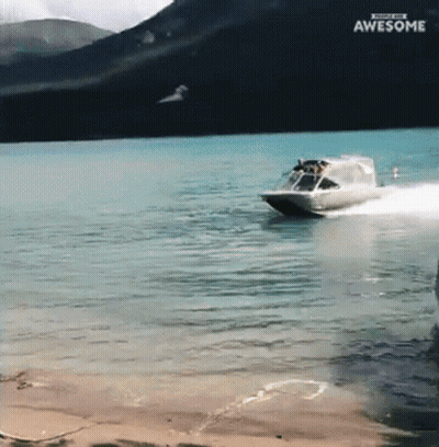 Boat Going Through Water Saying Awesome GIF
