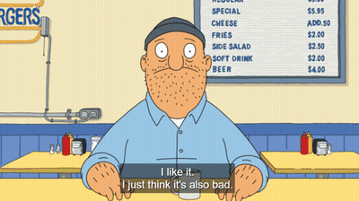 Bob From Bobs Burgers Sitting At Table GIF