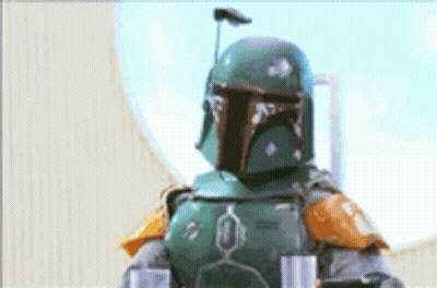 Boba Fett Is Standing In Front Of A Window Wearing A Helmet . GIF
