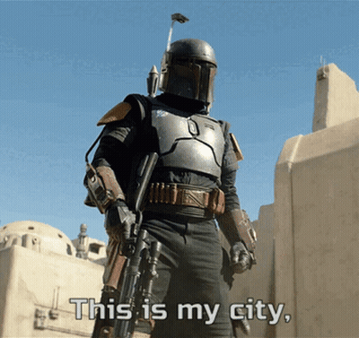 Boba Fett Standing In Front Of Building Saying This Is My City GIF