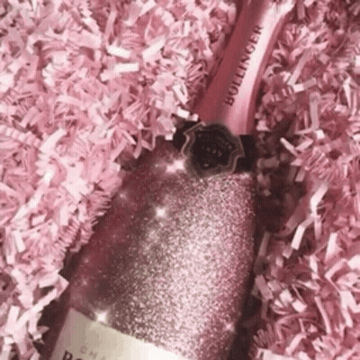 Bollinger Champagne Surrounded By Pink Paper GIF