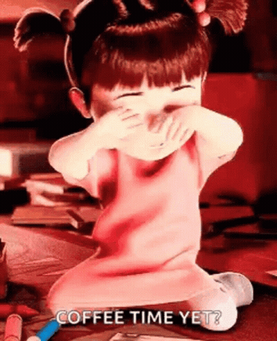 Boo From Monsters Inc Is Covering Her Mouth With Her Hands While Sitting On A Table . GIF