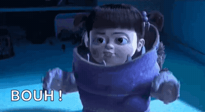Boo In Purple Making Face From Monsters Inc GIF