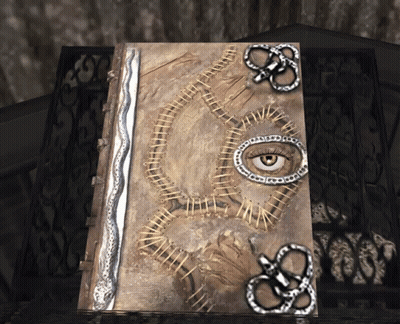 Book With Snake On Cover And Snake Eye GIF