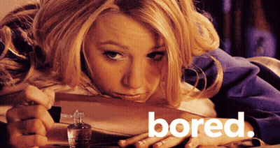 Bored Woman Lying On Table GIF