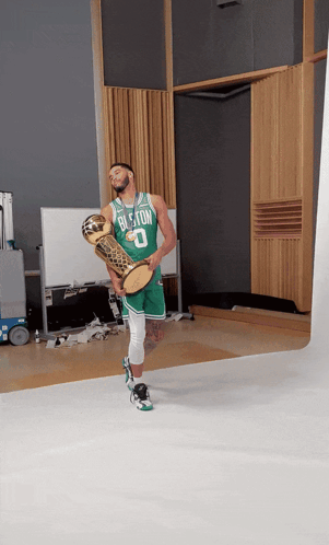 Boston Celtics Player Holding Trophy GIF