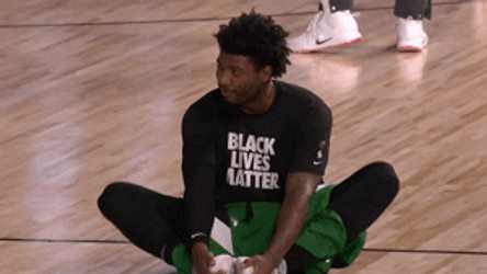 Boston Celtics Player Laughing While Stretching GIF