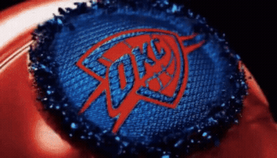 Bottle Cap With Oklahoma City Thunder Logo GIF