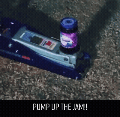 Bottle of Grape Jam on Blue Floor Jack
