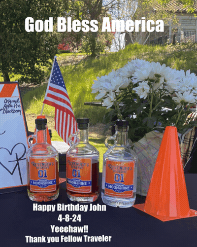 Bottle Of Moonshine With Flowers And American Flag GIF